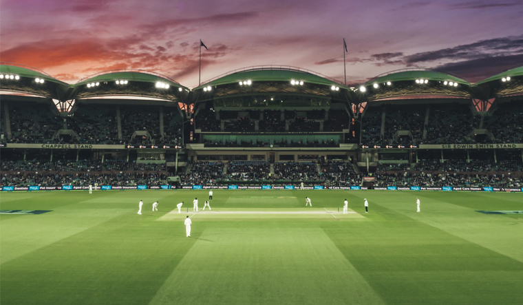 cricket match in a stadium