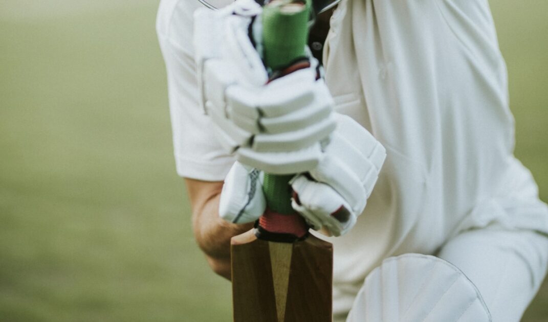 Cricketer on the field in batting position