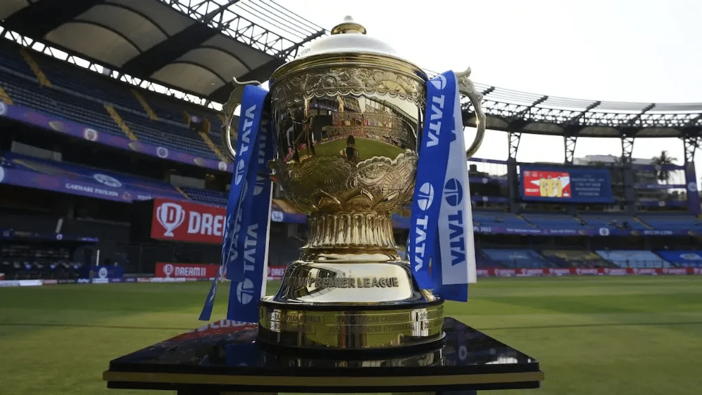 IPL trophy in an empty cricket stadium